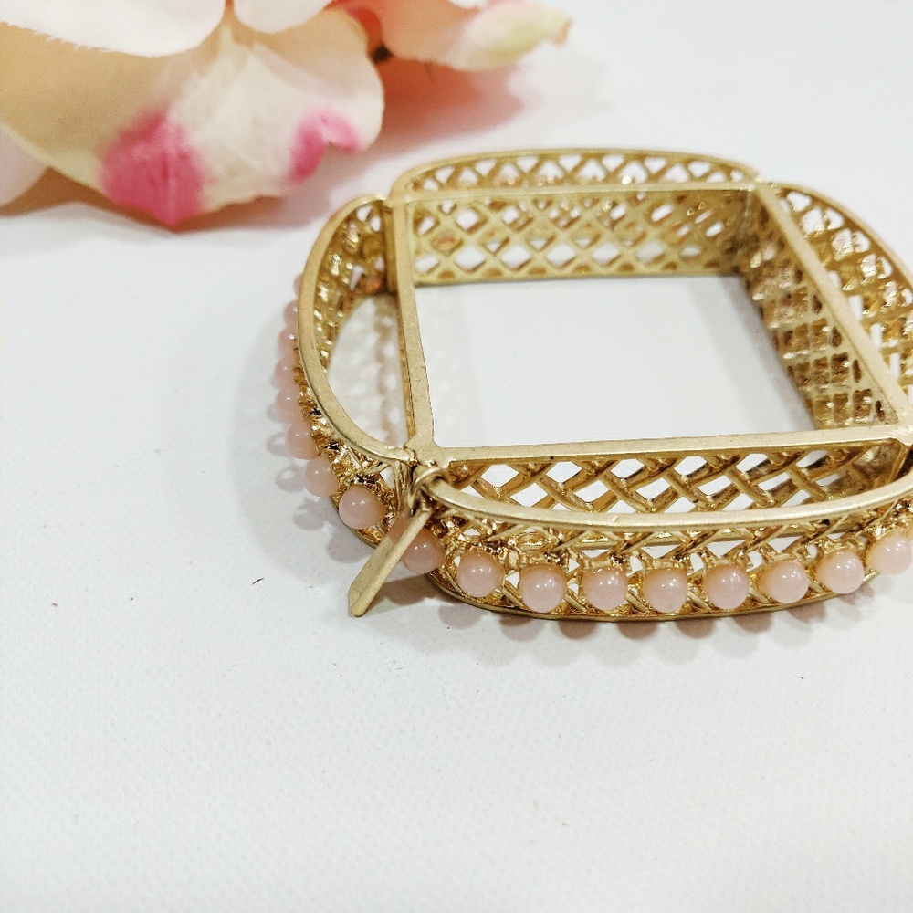 JewelMint Karma Bangle Bracelet with pink opals